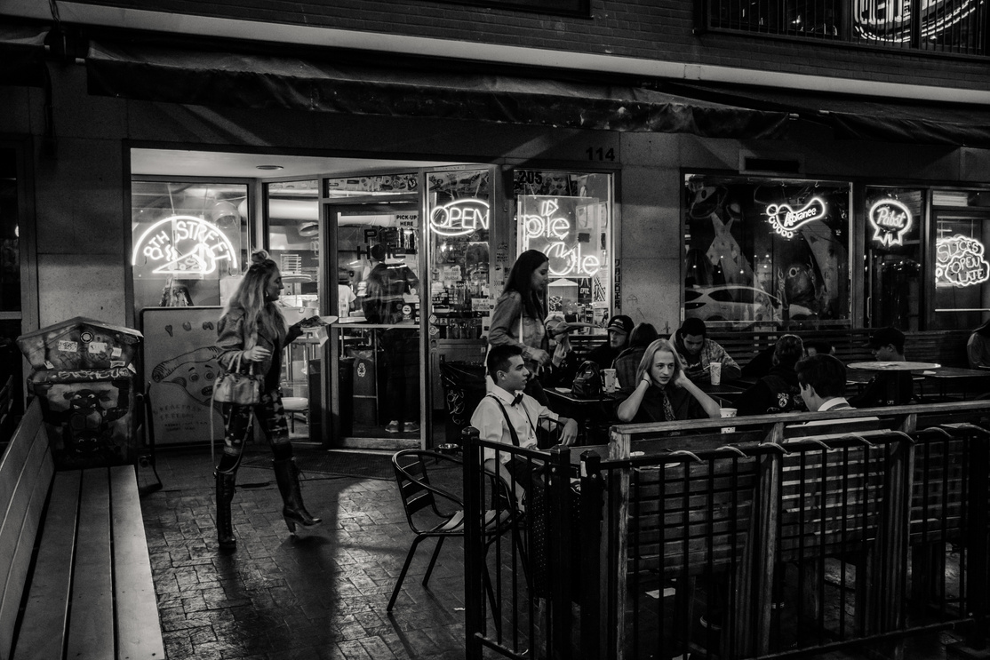 Grayscale Photography of People Near Bar
